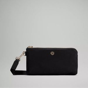 NWOT - Lululemon Curved Wristlet in Black with Gold Hardware